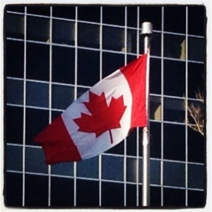 March 2013 The Canadian Flag flies over downtown Calgary