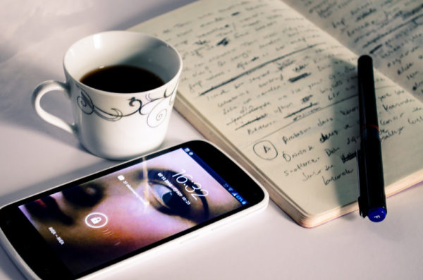 Image of notepad and coffee