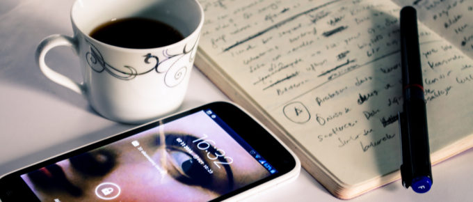 Image of notepad and coffee