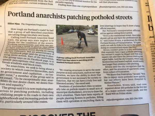 Portland anarachists patching potholed streets